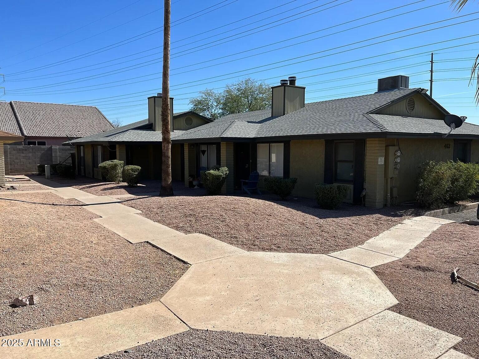 463 North 64th Place, Unit 1 Mesa, AZ 85205 - Photo 2 of 19 a front view of a house with a yard