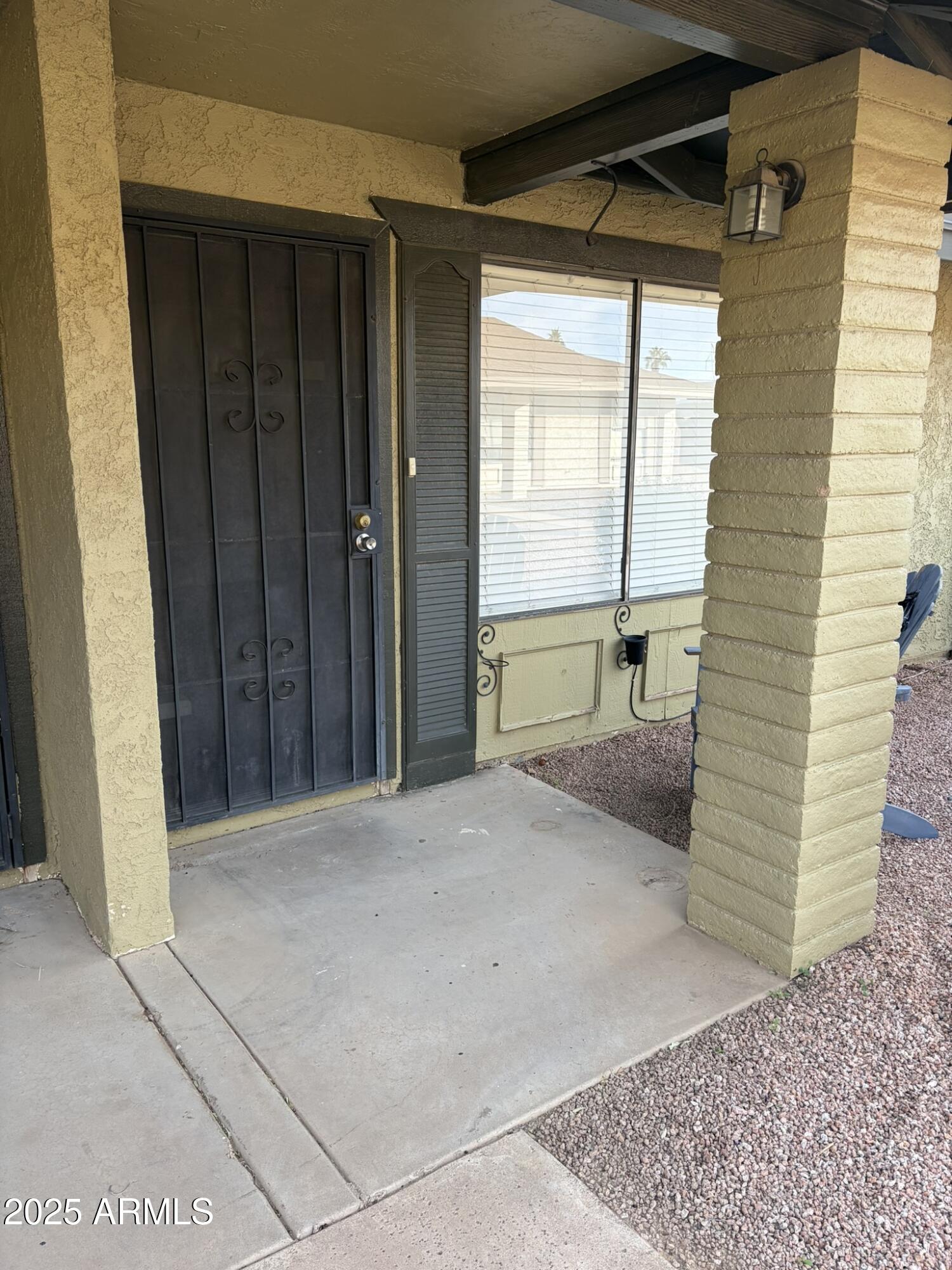 463 North 64th Place, Unit 1 Mesa, AZ 85205 - Photo 3 of 19 a view of an empty room with a window