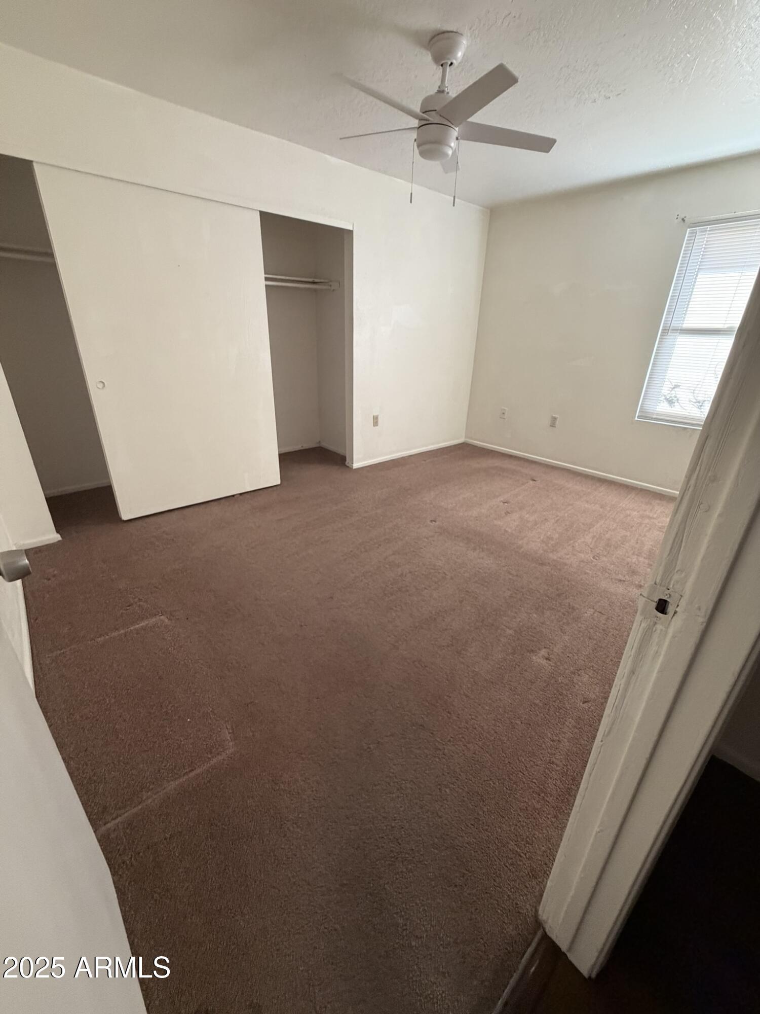 463 North 64th Place, Unit 1 Mesa, AZ 85205 - Photo 8 of 19 a view of an empty room