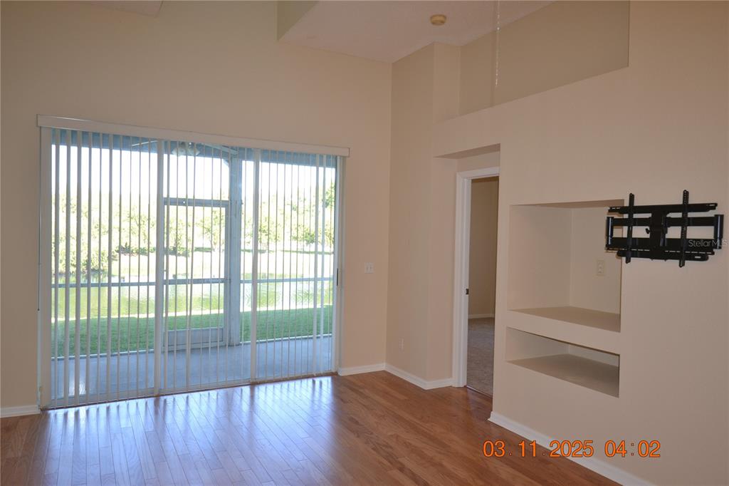 204 Hemingway Drive Oldsmar, FL 34677 - Photo 15 of 35 a view of a room with wooden floor and floors