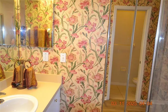 a bathroom with a shower curtain