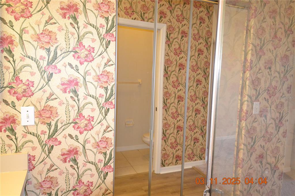 204 Hemingway Drive Oldsmar, FL 34677 - Photo 27 of 35 a bathroom with a shower curtain