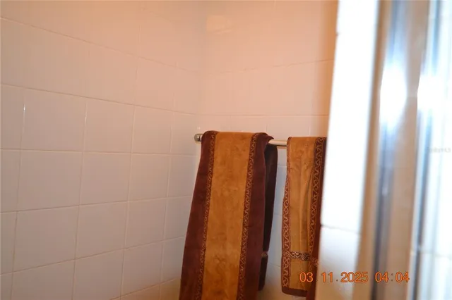 a bathroom with a shower curtain