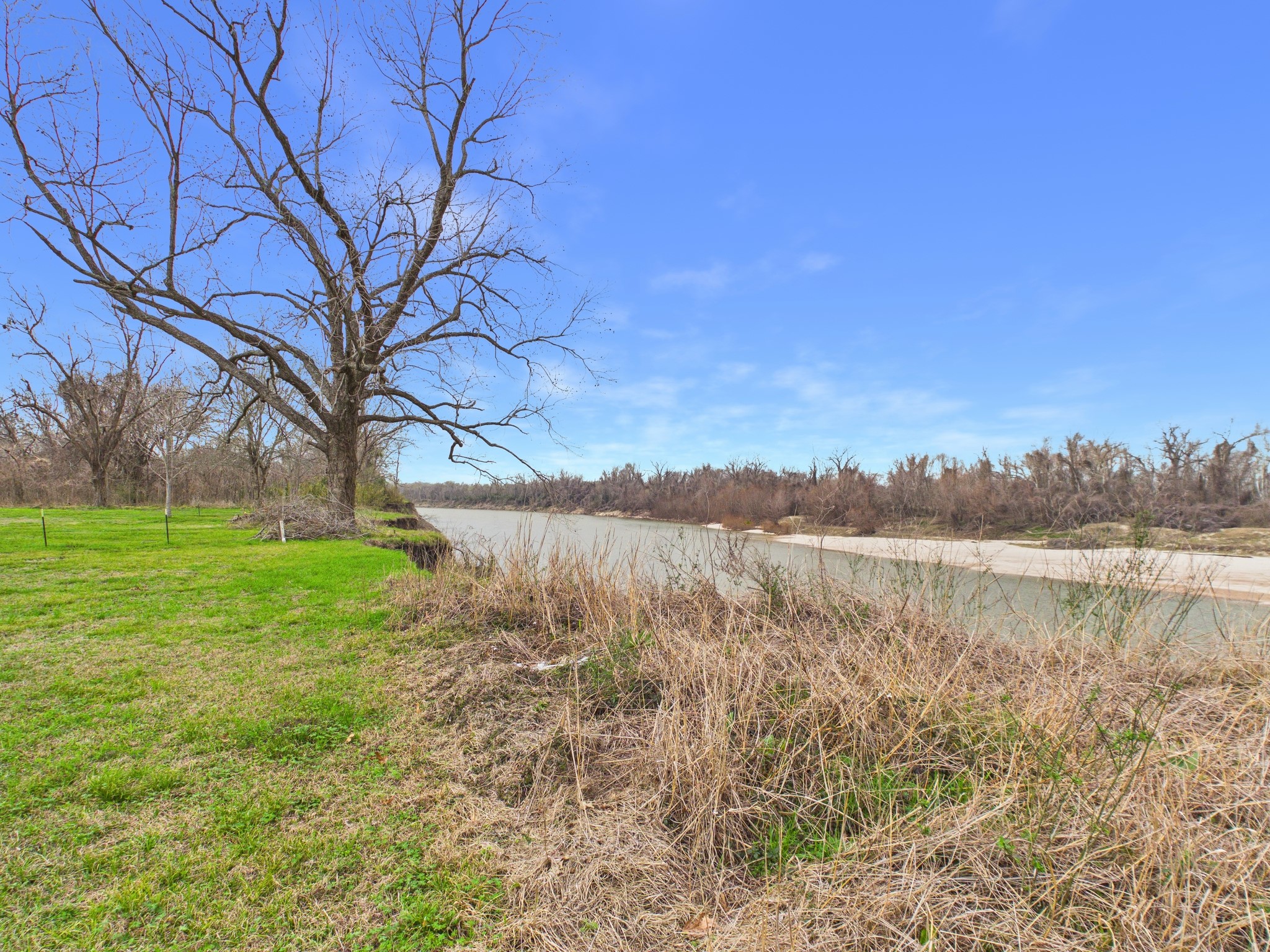 282 B Rte 66 Livingston, TX 77351 - Photo 13 of 25 a view of lake with mountain in the back