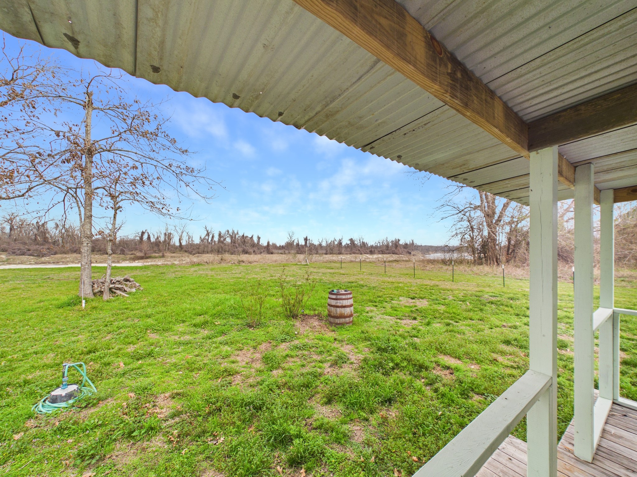 282 B Rte 66 Livingston, TX 77351 - Photo 15 of 25 a view of a lake from a yard