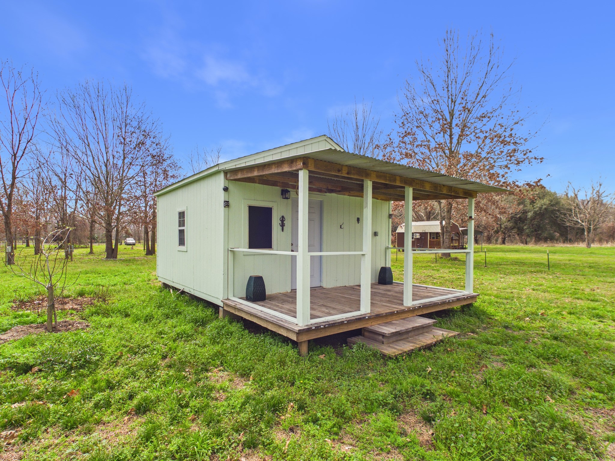 282 B Rte 66 Livingston, TX 77351 - Photo 2 of 25 a view of a house with a yard