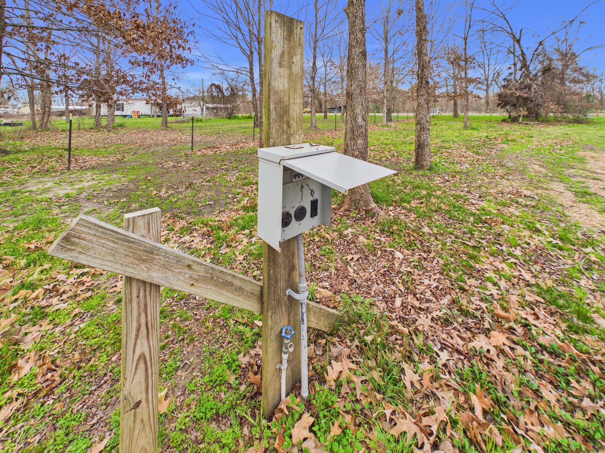 282 B Rte 66 Livingston, TX 77351 - Photo 22 of 25 a view of a garden with a bench in the garden