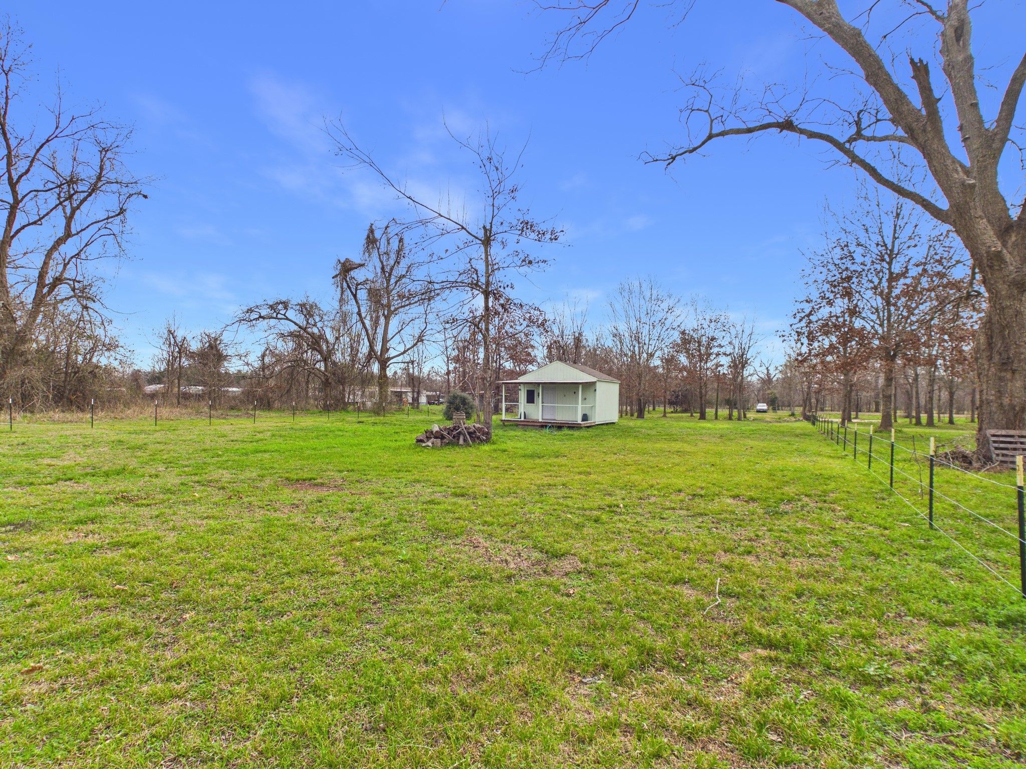 282 B Rte 66 Livingston, TX 77351 - Photo 10 of 25 a view of a house with a yard