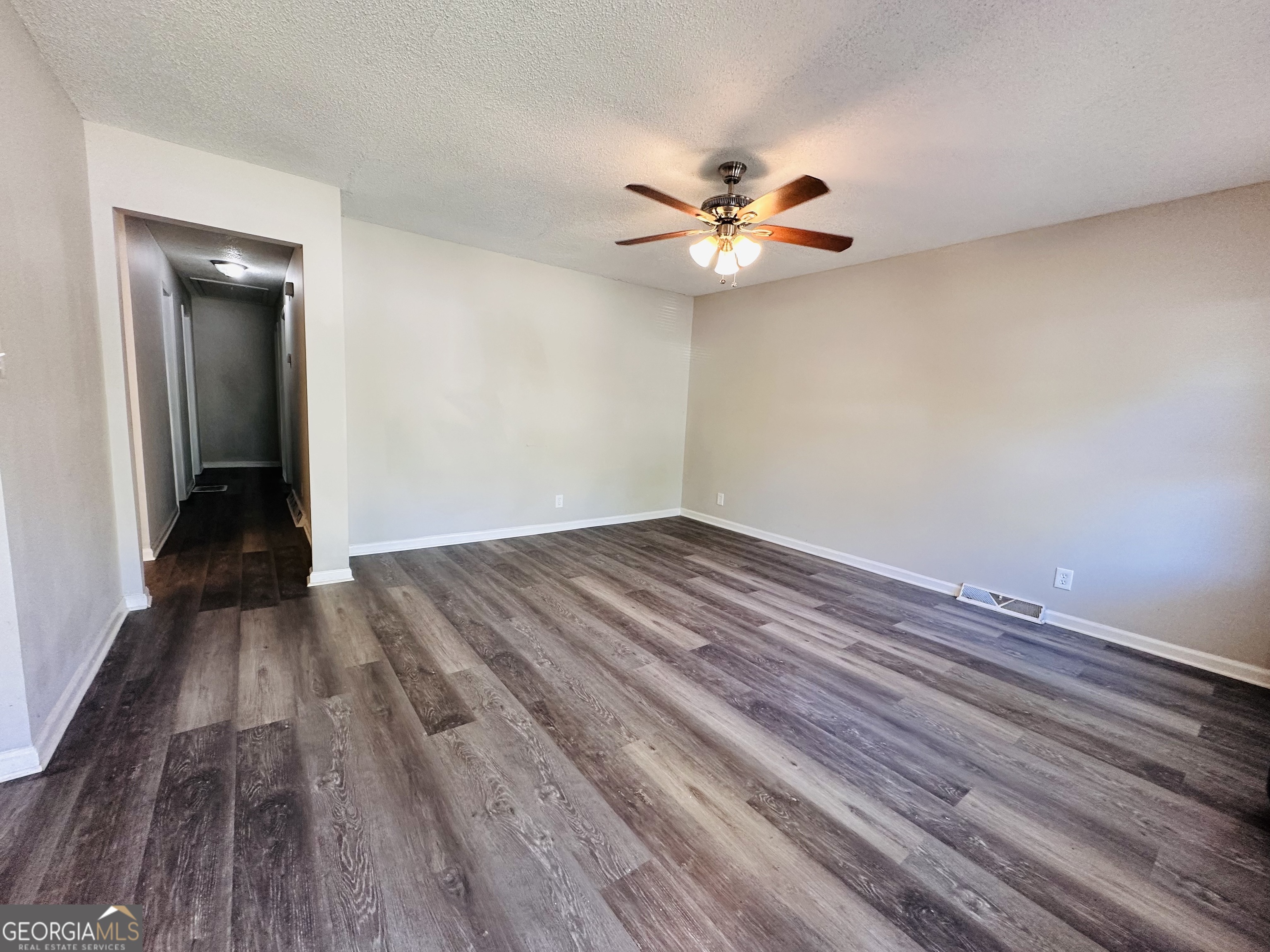 514 South Broad Street Toccoa, GA 30577 - Photo 2 of 22 wooden floor in an empty room