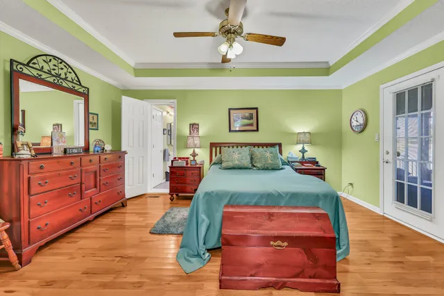 a bathroom with a sink a toilet and a shower