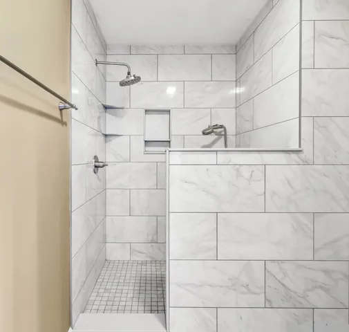 a living room with furniture and window