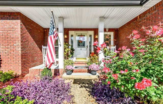 a front view of a house with a garage