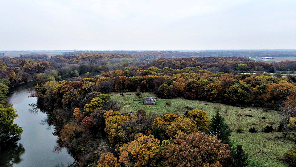 1250 North 1259th Road Grand Ridge, IL 61325 - Photo 3 of 9 an aerial view of green landscape with trees and houses