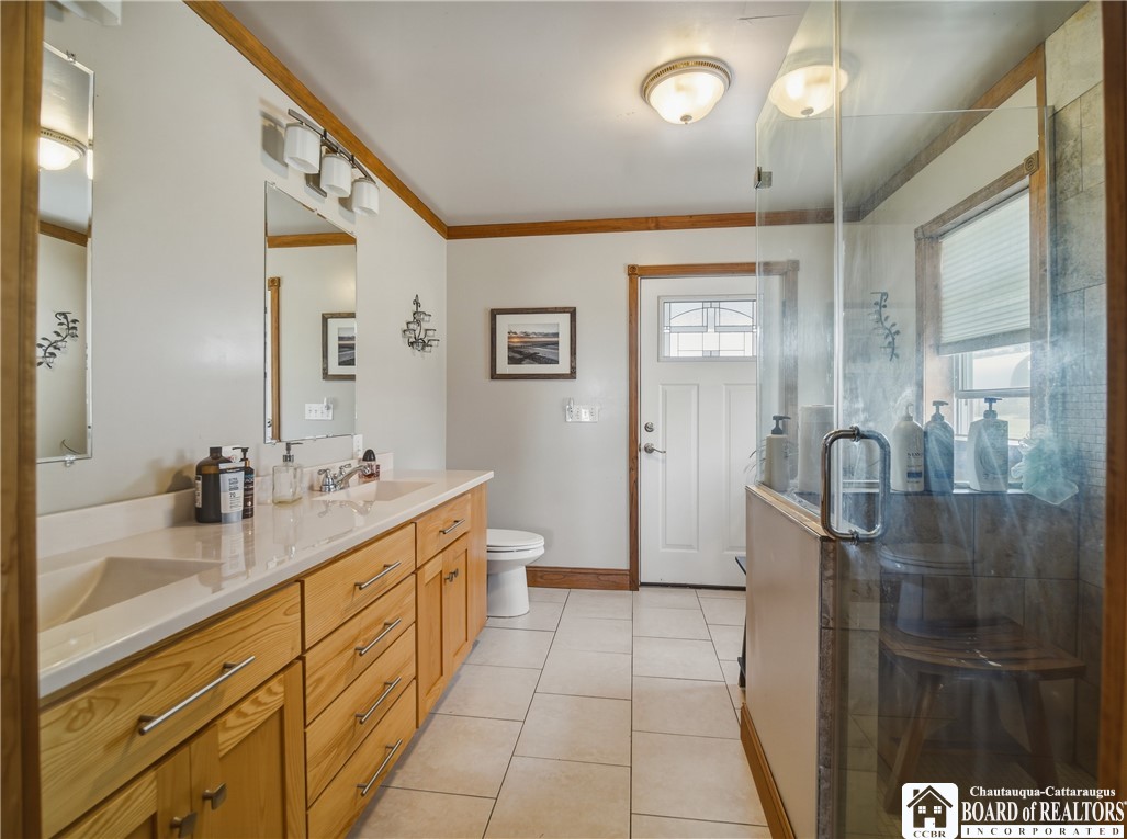1546 Swede Road Harmony, NY 14710 - Photo 36 of 49 Primary bath...door to the deck and hot tub