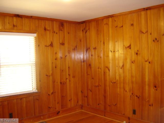 1002 Gideon Grove Road Stokesdale, NC 27357 - Photo 8 of 12 3rd Bedroom. Bedroom 3 with original paneling