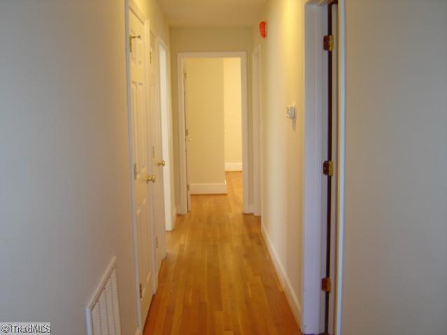 1002 Gideon Grove Road Stokesdale, NC 27357 - Photo 9 of 12 Other. Hallway with refinished hardwood flrs.
