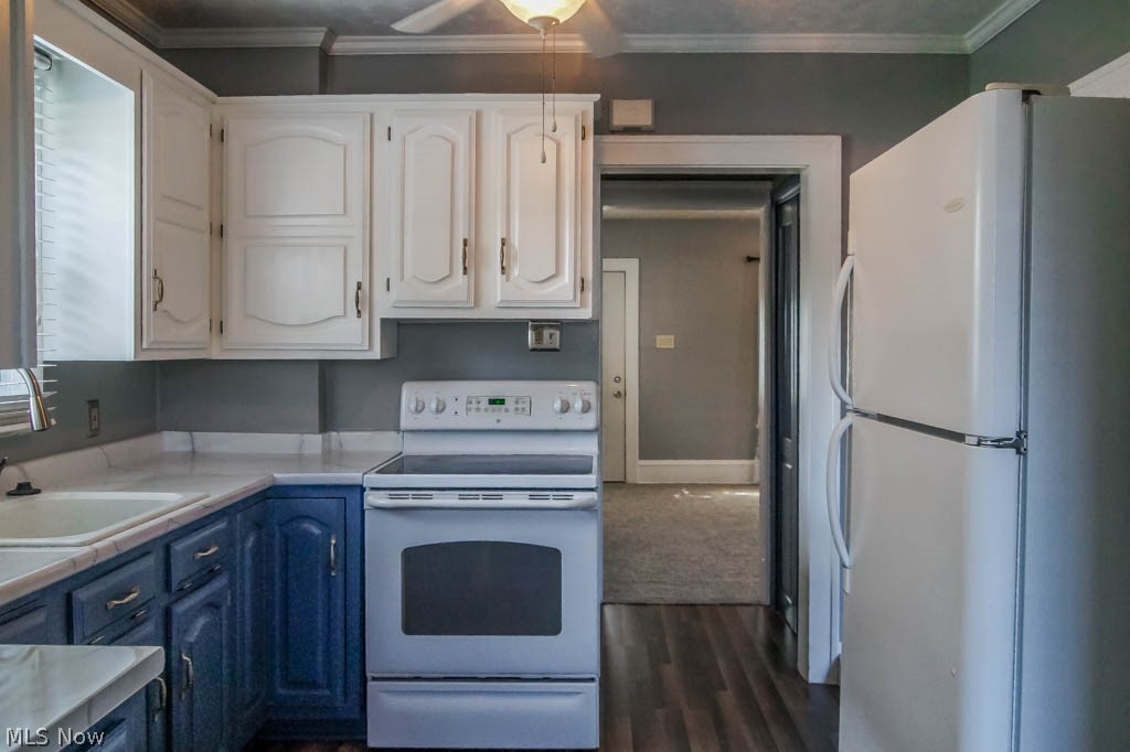 2301 9th Street Northwest Canton, OH 44708 - Photo 5 of 21 The kitchen comes applianced with an oven/range and refrigerator.