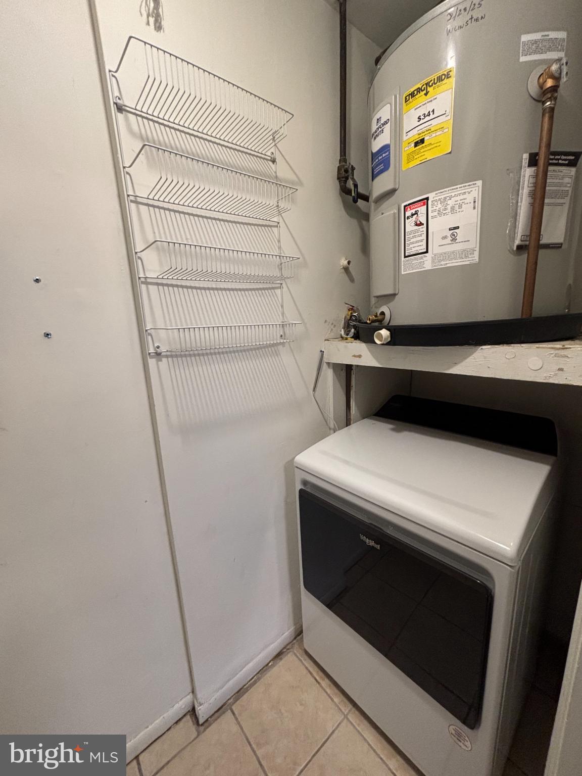 612 North Shady Retreat Road, Unit 55 Doylestown, PA 18901 - Photo 21 of 23 a utility room with dryer and washer