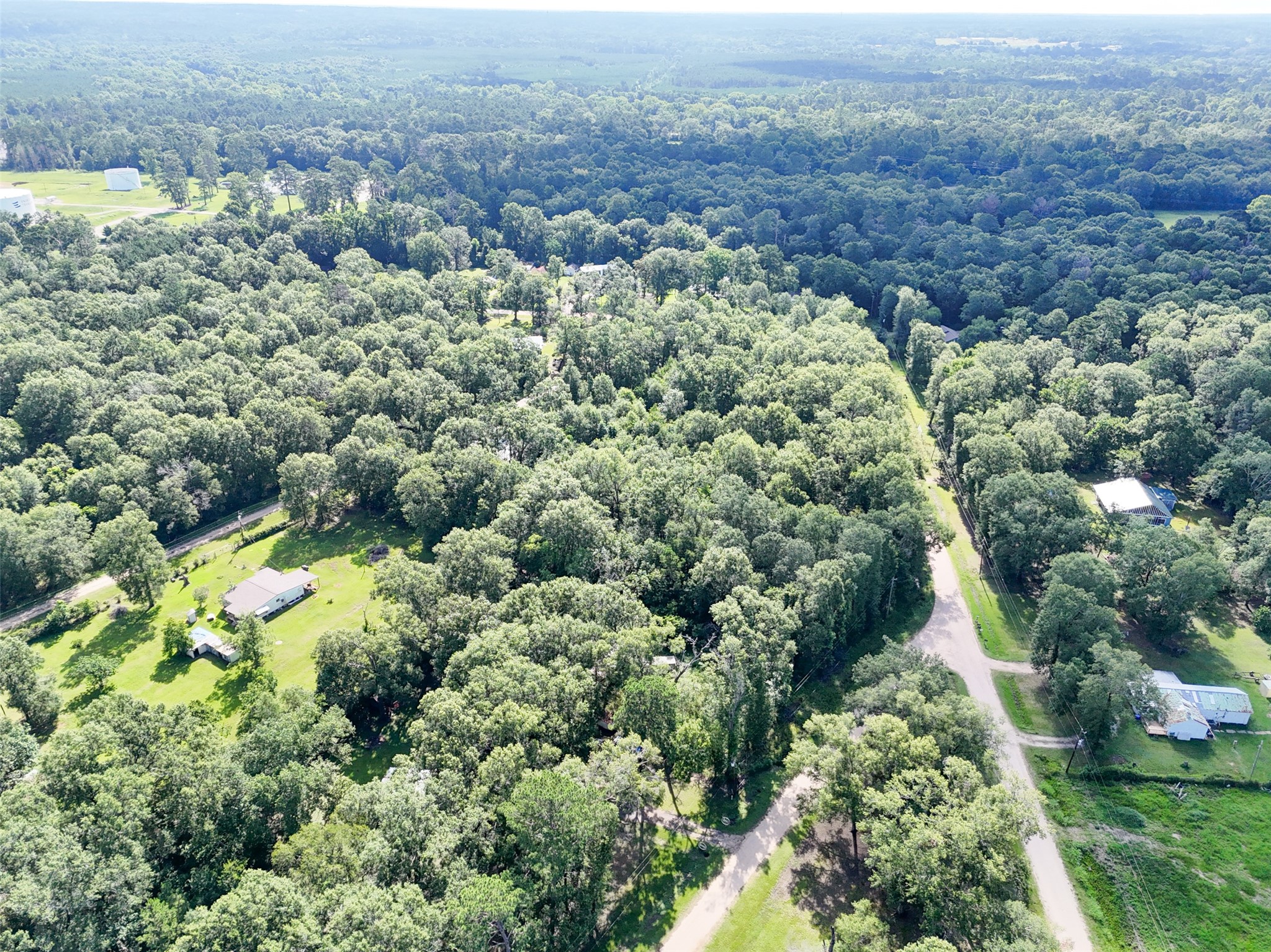 116 San Juan Livingston, TX 77351 - Photo 13 of 24 an aerial view of a house with a yard