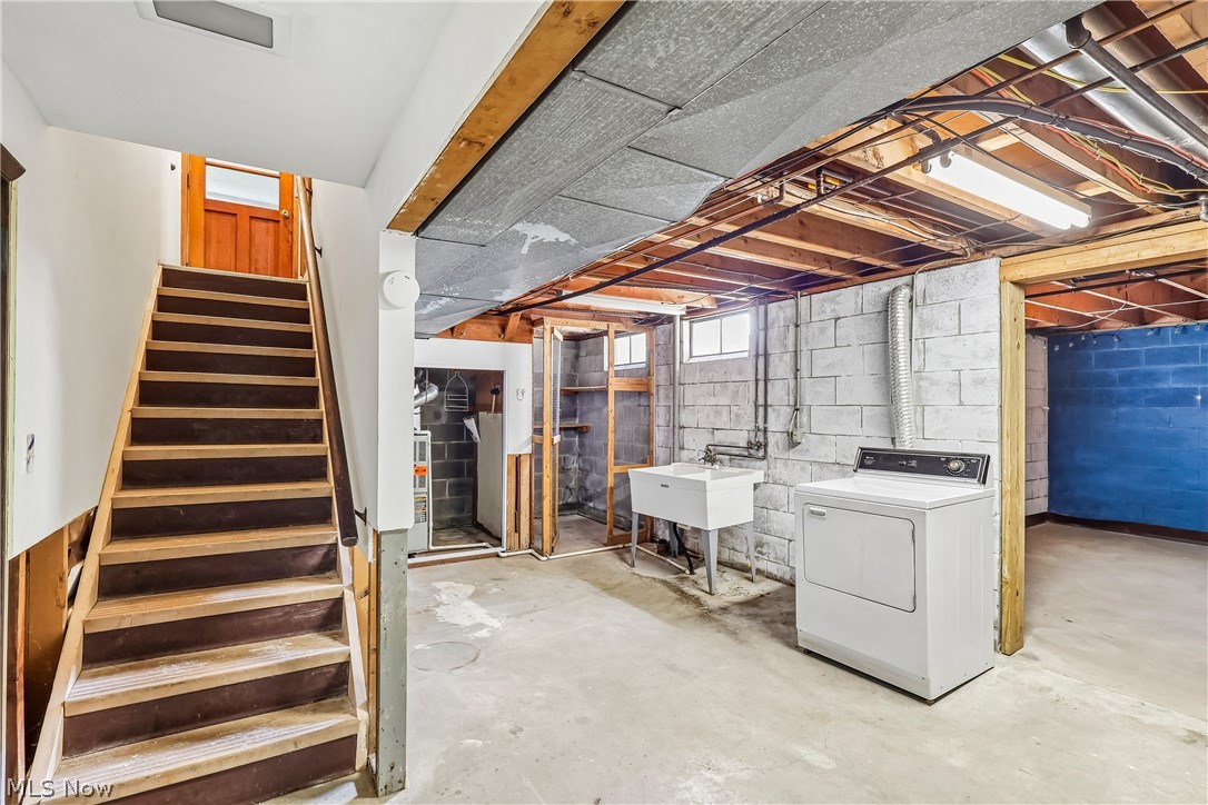 2758 Shellhart Road Norton, OH 44203 - Photo 25 of 41 Stairs to lower level with utility tub