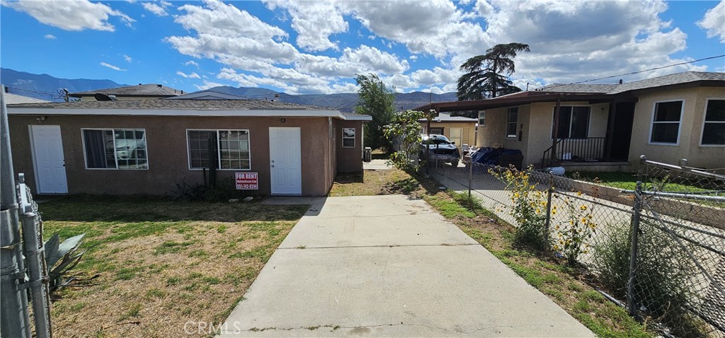 1530 East Jacinto View Road Banning, CA 92220 - Photo 2 of 9 a front view of house with yard outdoor seating and barbeque oven