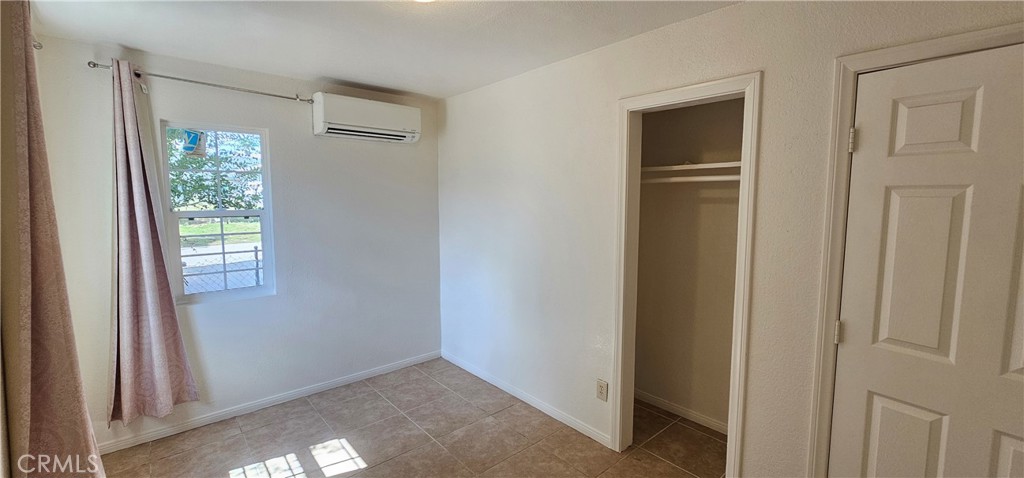 1530 East Jacinto View Road Banning, CA 92220 - Photo 5 of 9 a view of an empty room with a window