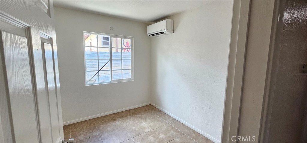 1530 East Jacinto View Road Banning, CA 92220 - Photo 7 of 9 a view of an empty room with windows and closet
