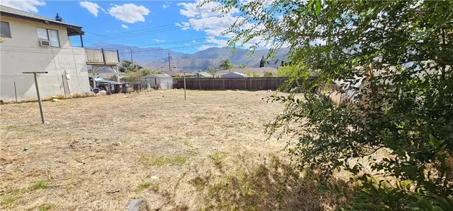 a view of a backyard of the house