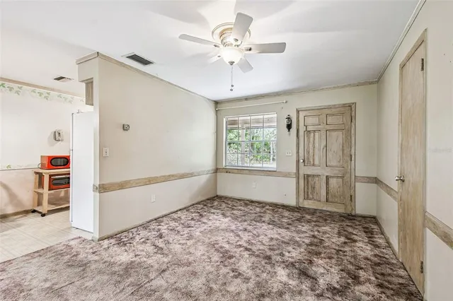 a backyard of a house with lots of green space