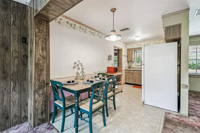 a view of a tree in front of a house