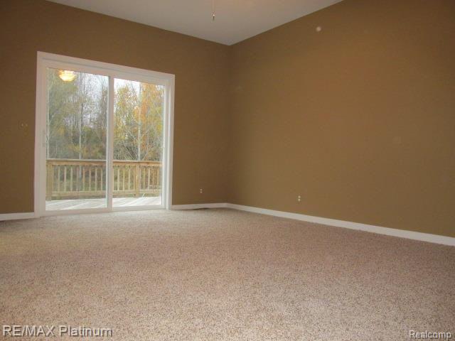 9094 Robb Road Fowlerville, MI 48836 - Photo 20 of 32 SPACIOUS MASTER BEDROOM SUITE W/DOORWALL TO DECK