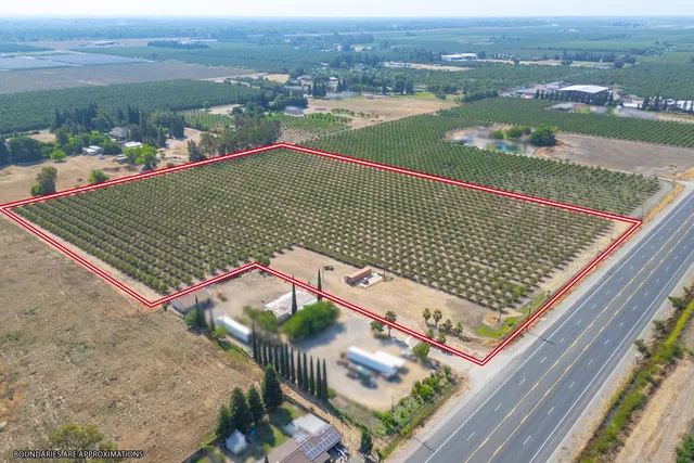 an outdoor space with wooden floor