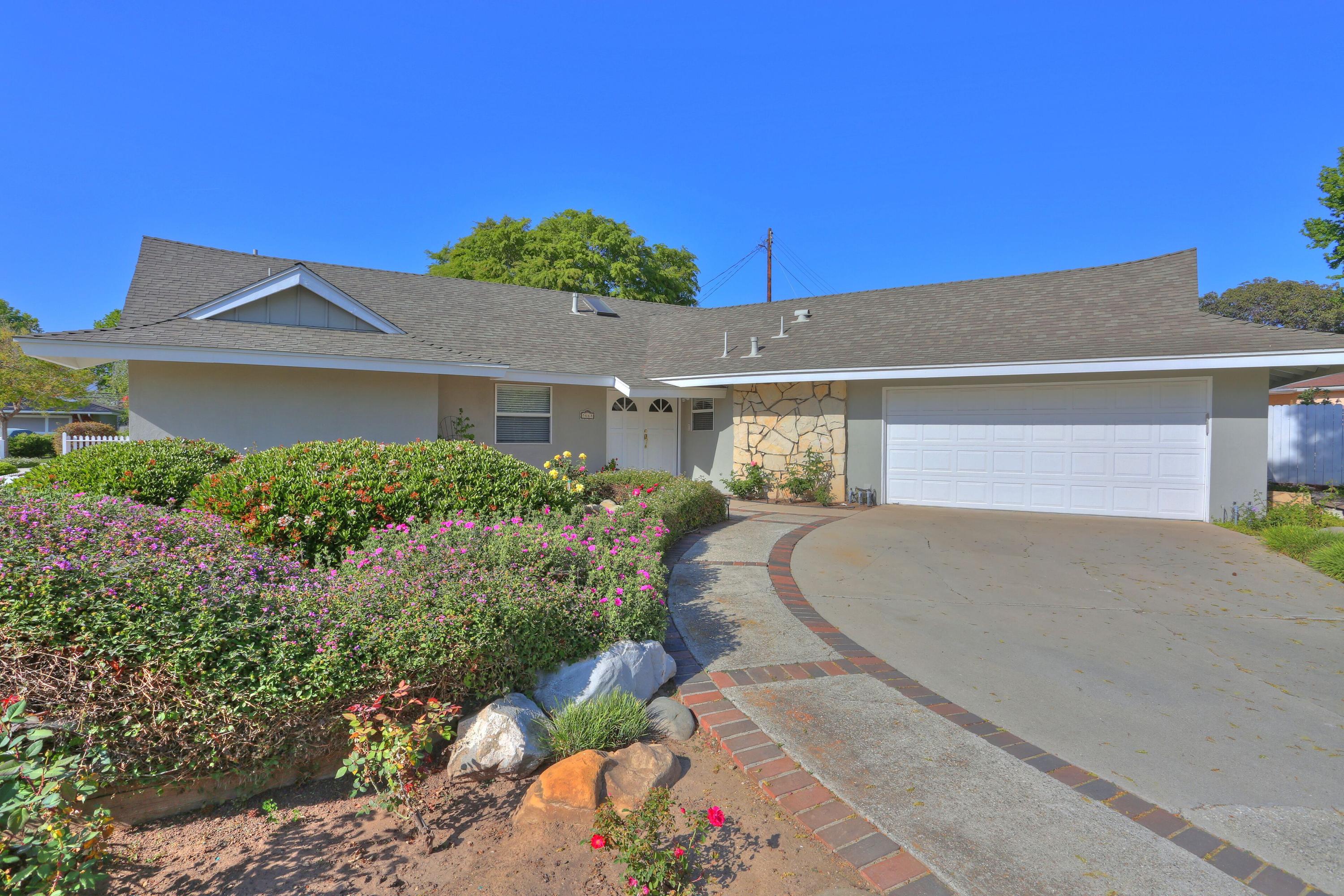 a house view with a outdoor space