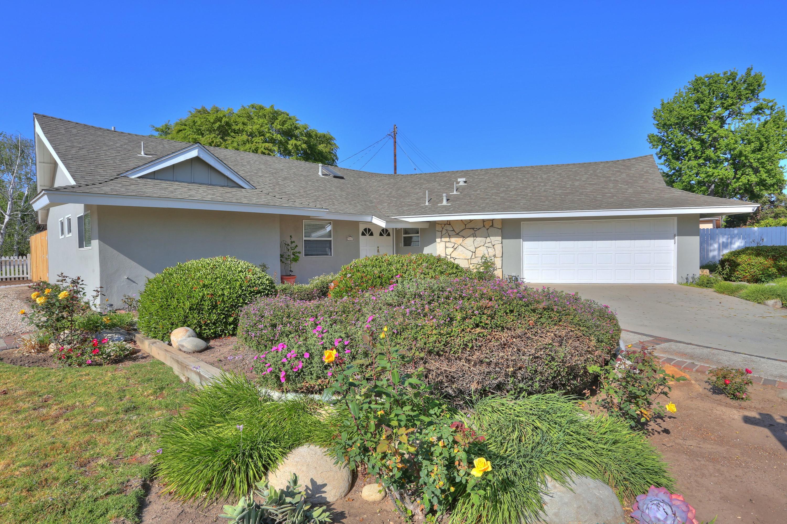 5668 Encina Road Goleta, CA 93117 - Photo 15 of 16 a front view of a house with a yard