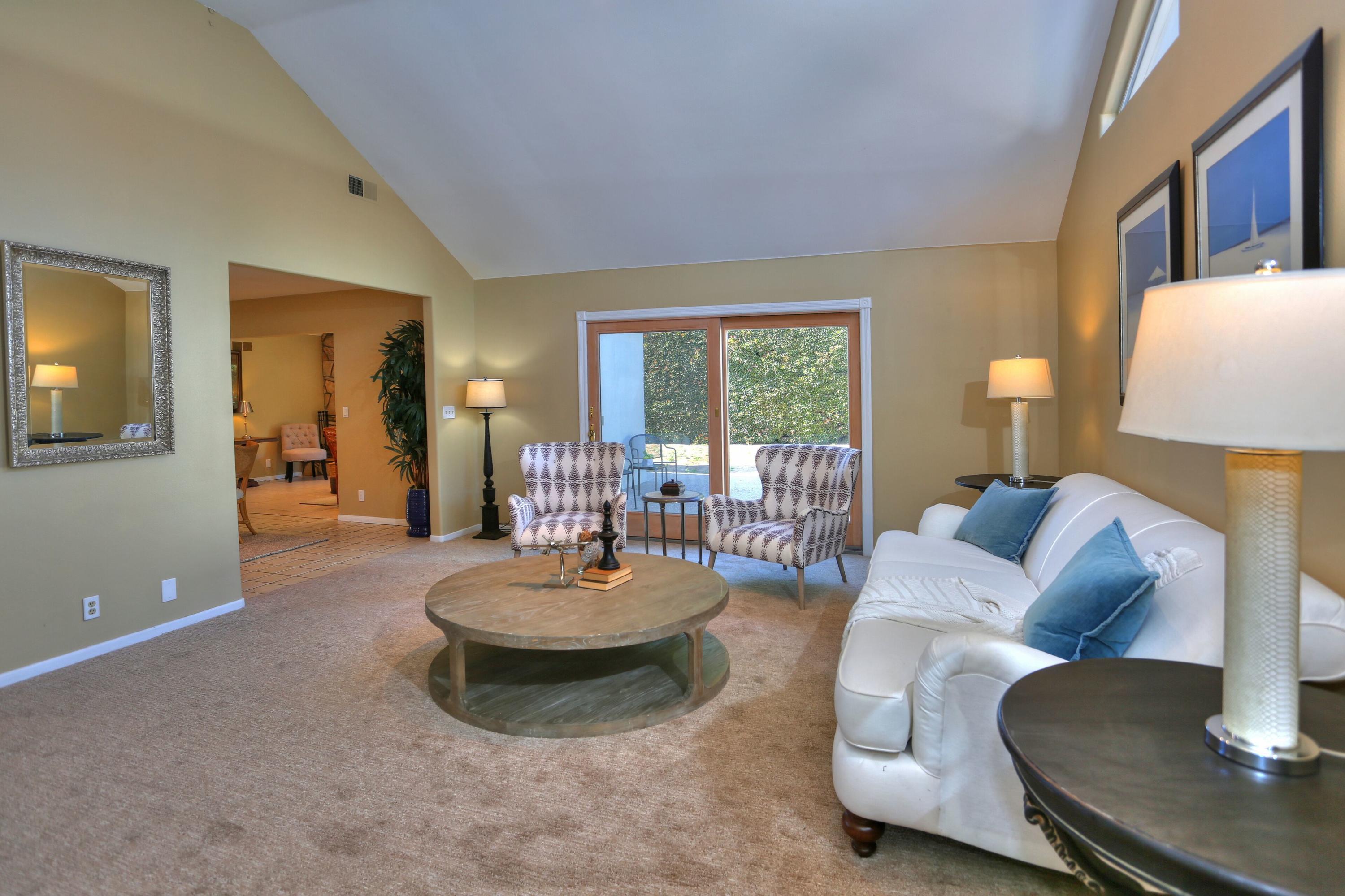 5668 Encina Road Goleta, CA 93117 - Photo 8 of 16 a living room with furniture and a table