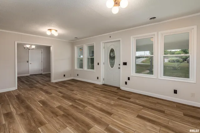 a view of a kitchen with granite countertop cabinets a sink and dishwasher