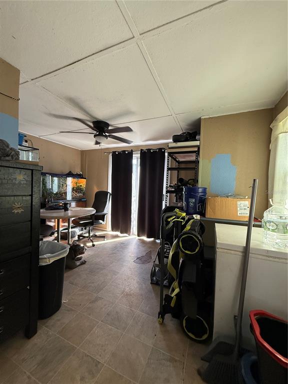 6100 Main Street, Unit A New Port Richey, FL 34653 - Photo 11 of 23 a view of a room with gym equipment