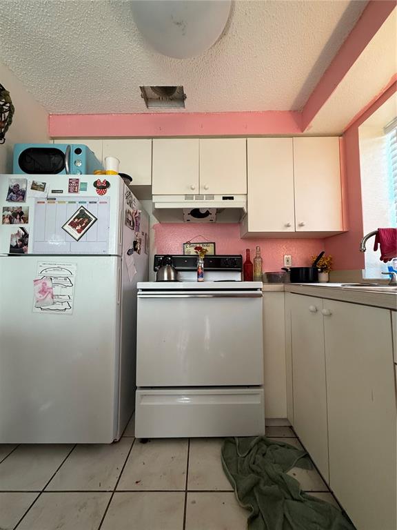 6100 Main Street, Unit A New Port Richey, FL 34653 - Photo 17 of 23 a utility room with washer and dryer