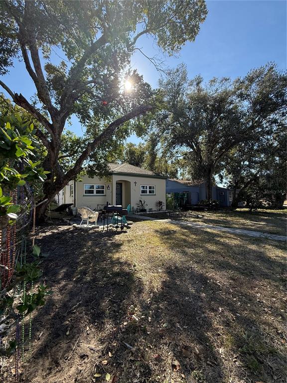 6100 Main Street, Unit A New Port Richey, FL 34653 - Photo 23 of 23 a view of a house with a yard