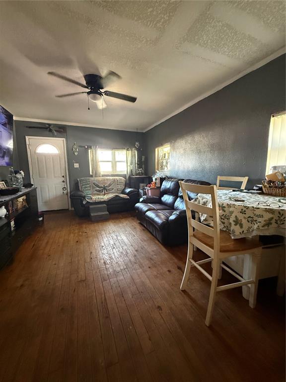 6100 Main Street, Unit A New Port Richey, FL 34653 - Photo 4 of 23 a living room with furniture and a wooden floor