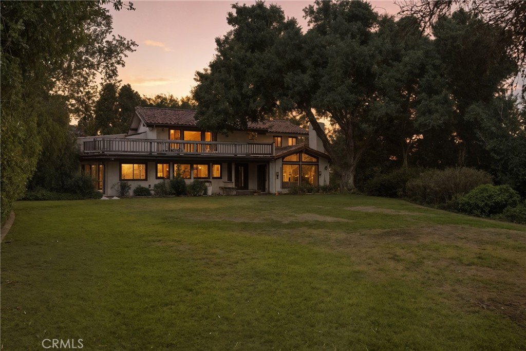 5750 Robin Court Santa Maria, CA 93455 - Photo 12 of 56 a front view of a house with a yard