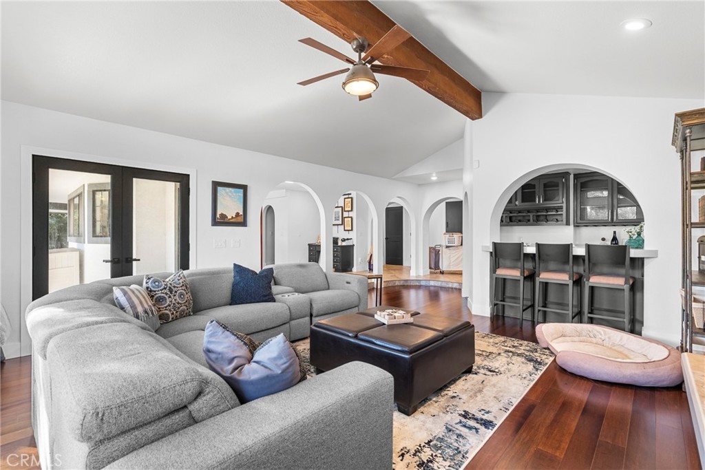 5750 Robin Court Santa Maria, CA 93455 - Photo 18 of 56 a living room with furniture a rug and a chandelier