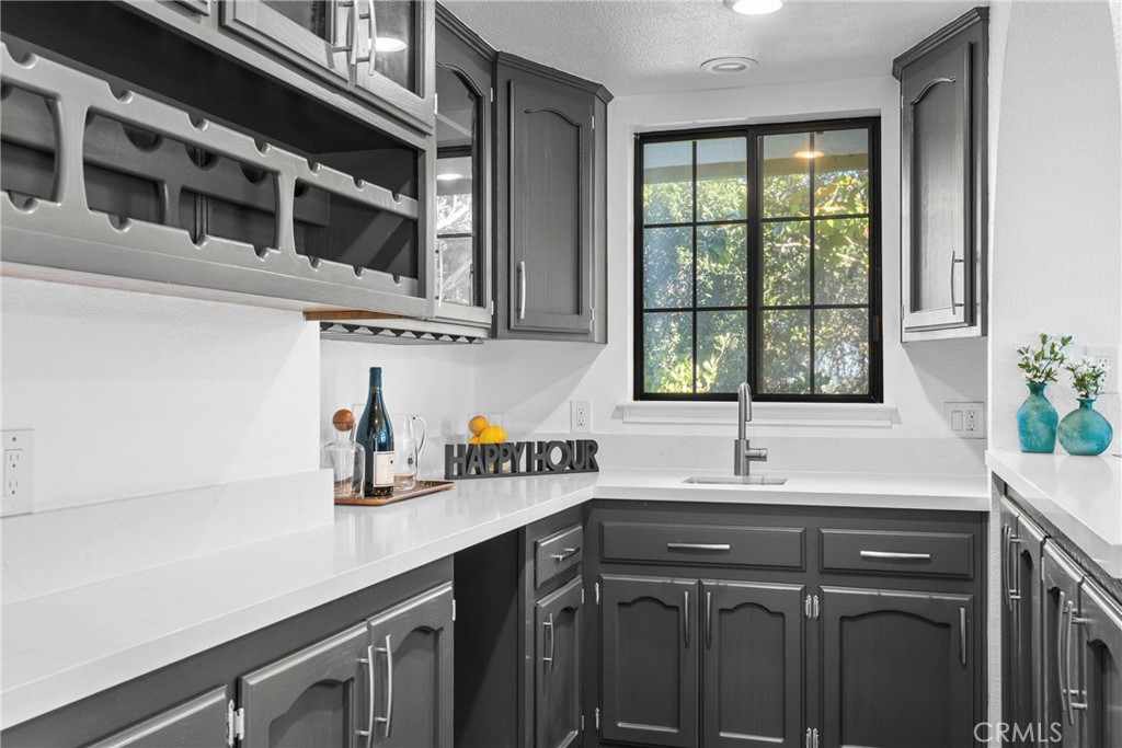 5750 Robin Court Santa Maria, CA 93455 - Photo 20 of 56 a kitchen with stainless steel appliances a sink and a window