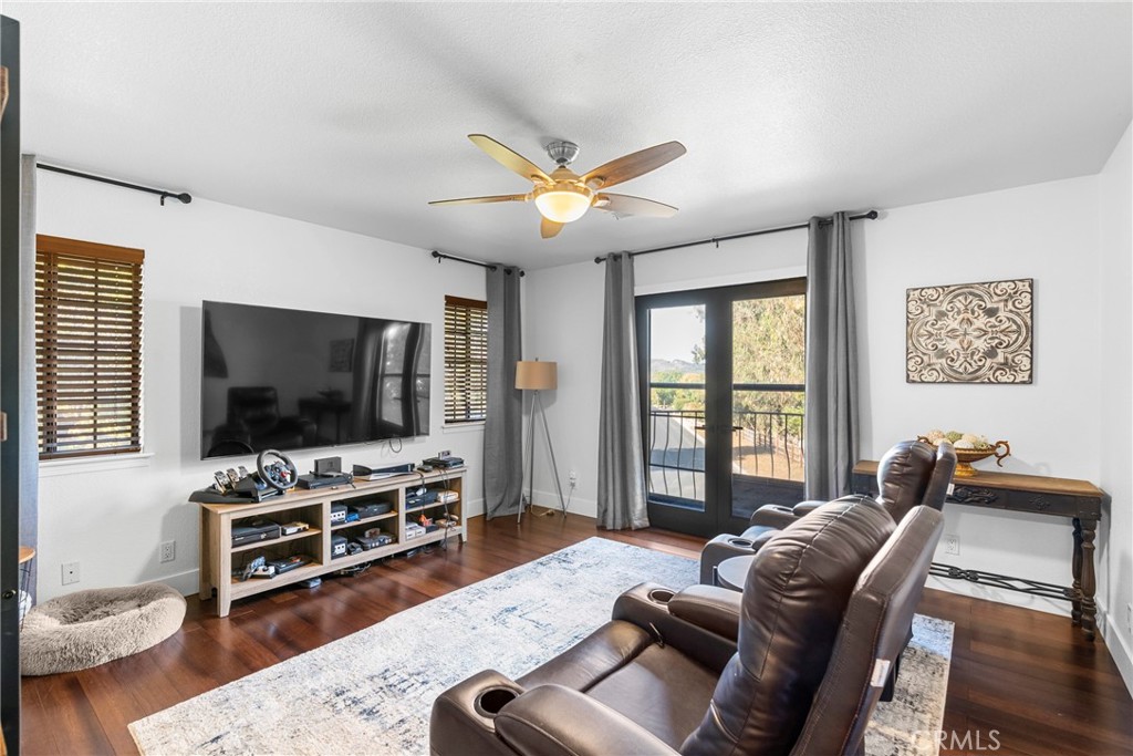 5750 Robin Court Santa Maria, CA 93455 - Photo 33 of 56 a living room with furniture and a flat screen tv