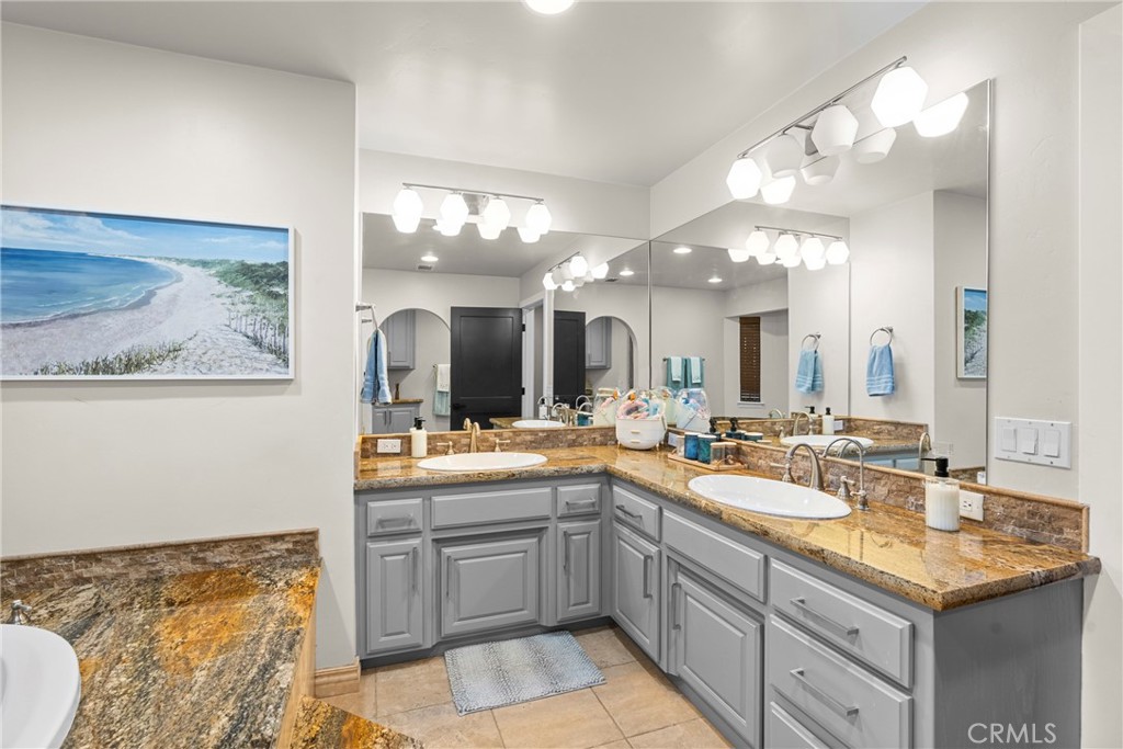 5750 Robin Court Santa Maria, CA 93455 - Photo 44 of 56 a large kitchen with a lot of counter space and a wooden floor