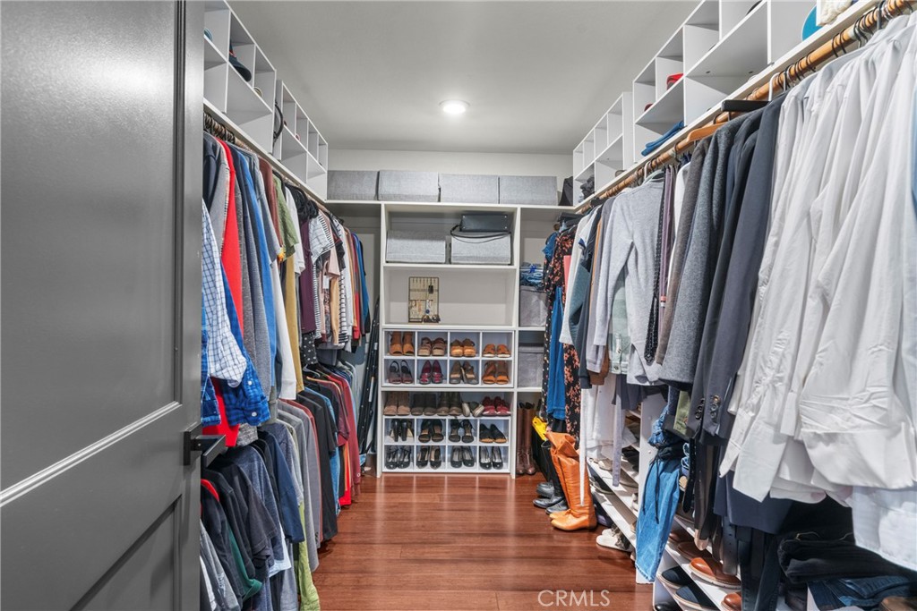 5750 Robin Court Santa Maria, CA 93455 - Photo 46 of 56 a view of walk in closet with clothes