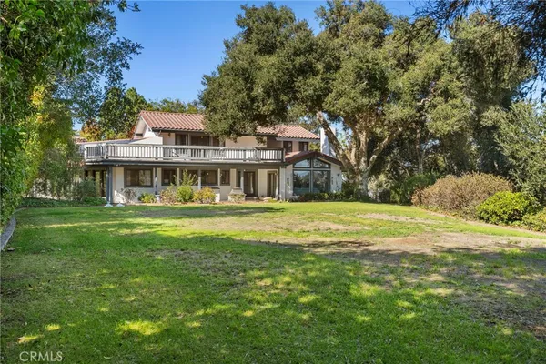 a view of a backyard with a patio