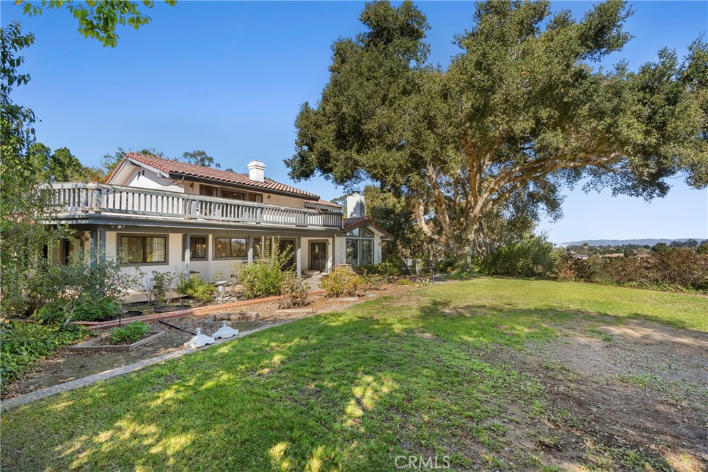 5750 Robin Court Santa Maria, CA 93455 - Photo 50 of 56 a front view of a house with a yard table and chairs