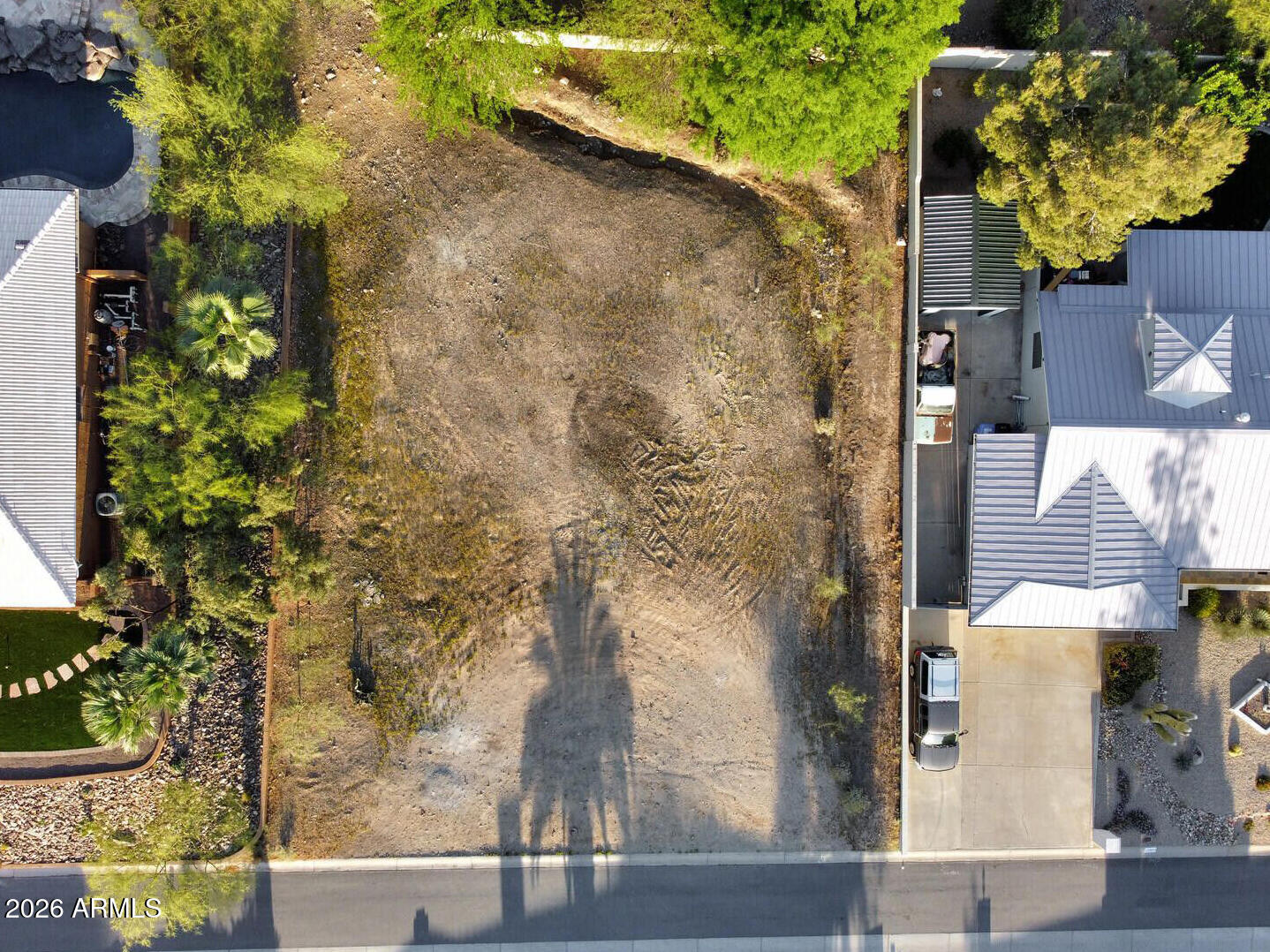 12654 North 17th Avenue, Unit 6 Phoenix, AZ 85029 - Photo 6 of 8 front view of a brick house with a yard