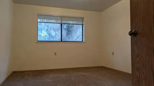 an empty room with a window